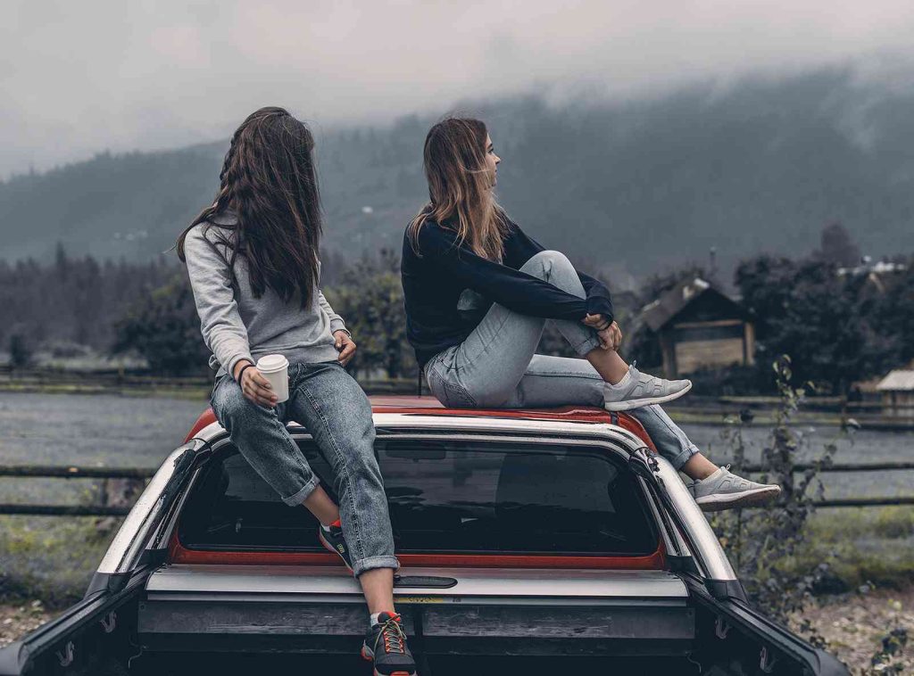 Exploring nature and enjoying the outdoors with friends on a cloudy day.