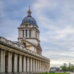 Iconic historic building with domed tower in London, UK.